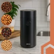 Elektrický mlynček na kávu s výkonom 150 W, kapacitou 50 g, dvoma nožmi a priehľadným vekom, čierny